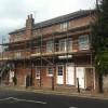 Scaffolding to repair gutters & repaint windows